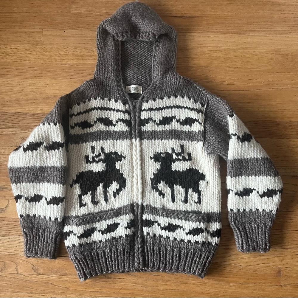 Cowichan zip front sweater with hood. Hand knit virgin wool. Worn a few times.